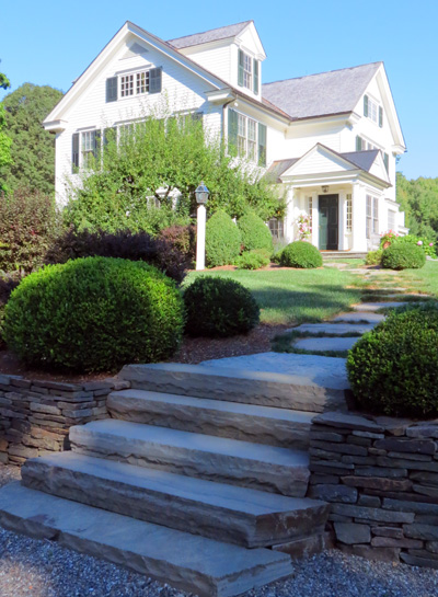 Steps can be built from a wide variety of materials to meet the needs of the landscape, while functioning safely. The staff at Millbrook Gardens Landscaping and Garden Center also specializes in the design and installation of natural rock paths that fit into a lawn area or between plantings. Photos by Curtis Schmidt.